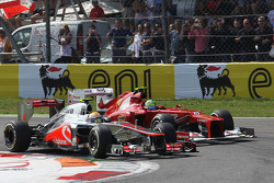 Lewis Hamilton, McLaren leads Felipe Massa, Ferrari at the start of the race