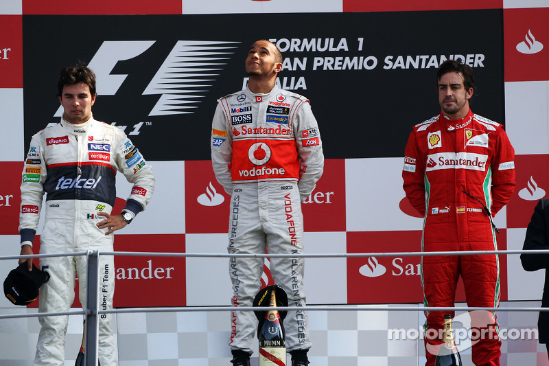 Podium: race winner Lewis Hamilton, McLaren Mercedes, second place place Sergio Perez, Sauber F1 Team, third place Fernando Alonso, Scuderia Ferrari