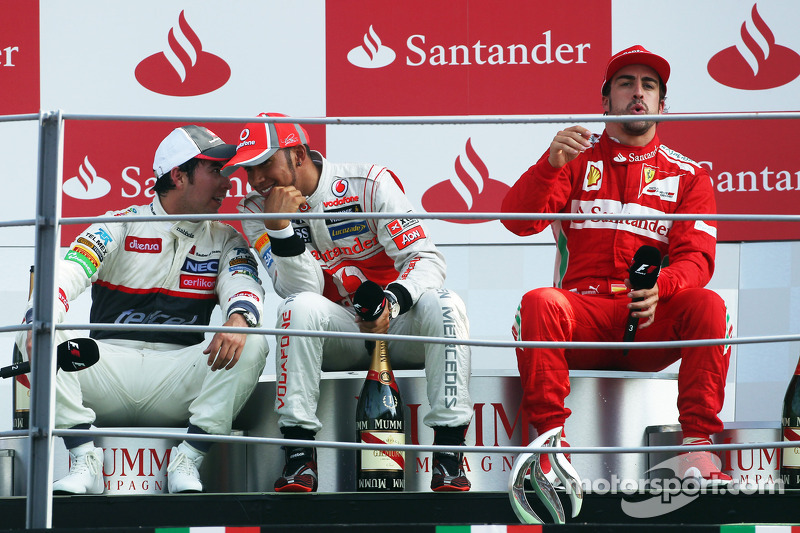 Podium: race winner Lewis Hamilton, McLaren Mercedes, second place place Sergio Perez, Sauber F1 Team, third place Fernando Alonso, Scuderia Ferrari