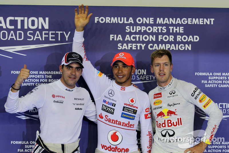 Pole winner Lewis Hamilton, McLaren, second place Pastor Maldonado, Williams, third place Sebastian 