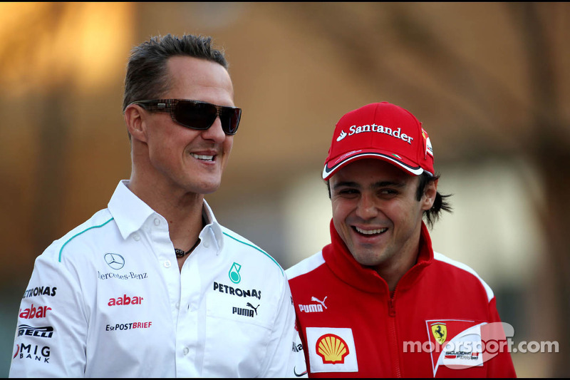 Michael Schumacher, Mercedes GP y Felipe Massa, Scuderia Ferrari