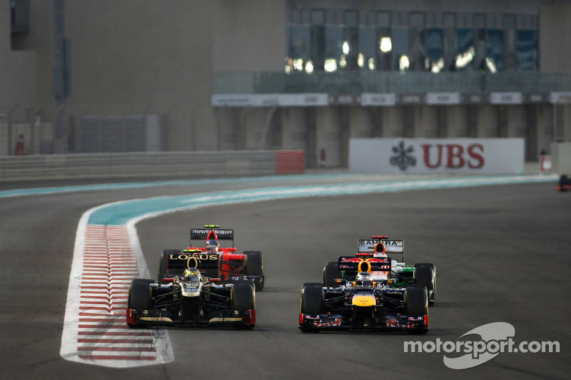 Romain Grosjean, Lotus F1 Team and Sebastian Vettel, Red Bull Racing