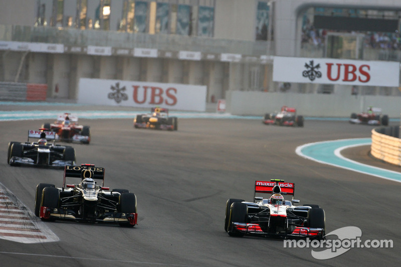 Kimi Raikkonen, Lotus F1 Team en Lewis Hamilton, McLaren Mercedes