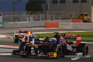 Daniel Ricciardo, Scuderia Toro Rosso leads Sebastian Vettel, Red Bull Racing
