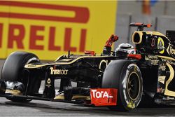 Race winner Kimi Raikkonen, Lotus F1 celebrates at the end of the race