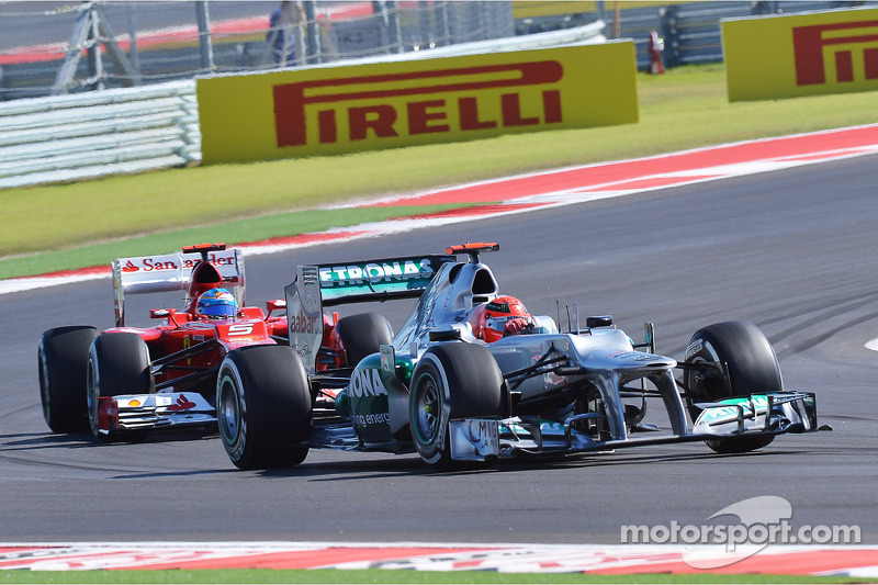 Michael Schumacher, Mercedes AMG F1 leads Fernando Alonso, Ferrari