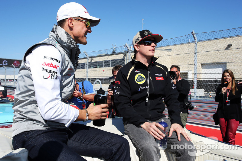 Michael Schumacher, Mercedes AMG F1 with Kimi Raikkonen, Lotus F1 Team on the drivers parade