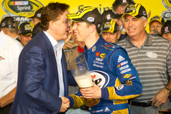 Championship victory lane: 2012 NASCAR Sprint Cup Series champion Brad Keselowski, Penske Racing Dodge celebrates with Brian France