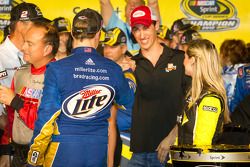 Championship victory lane: 2012 NASCAR Sprint Cup Series champion Brad Keselowski, Penske Racing Dodge congratulated by Joey Logano, Joe Gibbs Racing Toyota