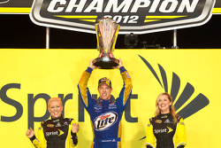 Championship victory lane: 2012 NASCAR Sprint Cup Series champion Brad Keselowski, Penske Racing Dodge celebrates with the Miss Sprint Cup girls