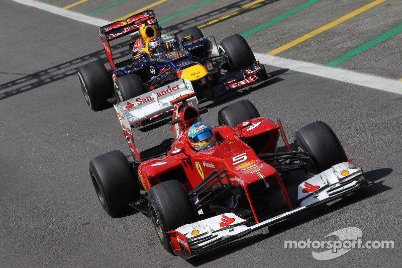 Fernando Alonso, Scuderia Ferrari leads Sebastian Vettel, Red Bull Racing