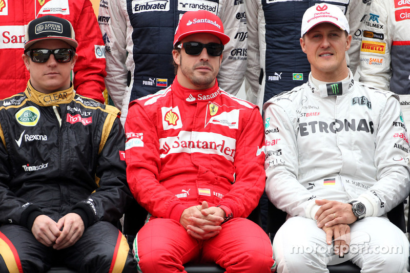 Kimi Raikkonen, Lotus F1 Team, Fernando Alonso, Scuderia Ferrari e Michael Schumacher, Mercedes GP