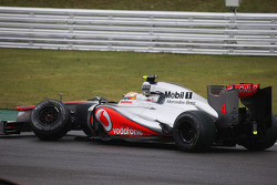 Lewis Hamilton, McLaren retired from the race after crashing with Nico Hulkenberg, Sahara Force India F1