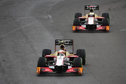 Narain Karthikeyan, HRT Formula One Team HRT leads team mate Pedro De La Rosa, HRT Formula 1 Team