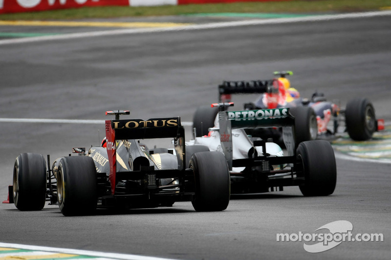 Michael Schumacher, Mercedes AMG F1, e Kimi Raikkonen, Lotus F1
