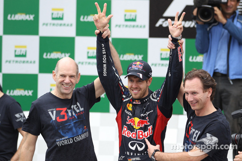 Sebastian Vettel, Red Bull Racing celebrates with the team and Adrian Newey, Red Bull Racing Chief Technical Officer and Christian Horner, Red Bull Racing Team Principal