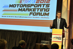 NASCAR CMO Steve Phelps speaks onstage at the NASCAR Motorsports Forum