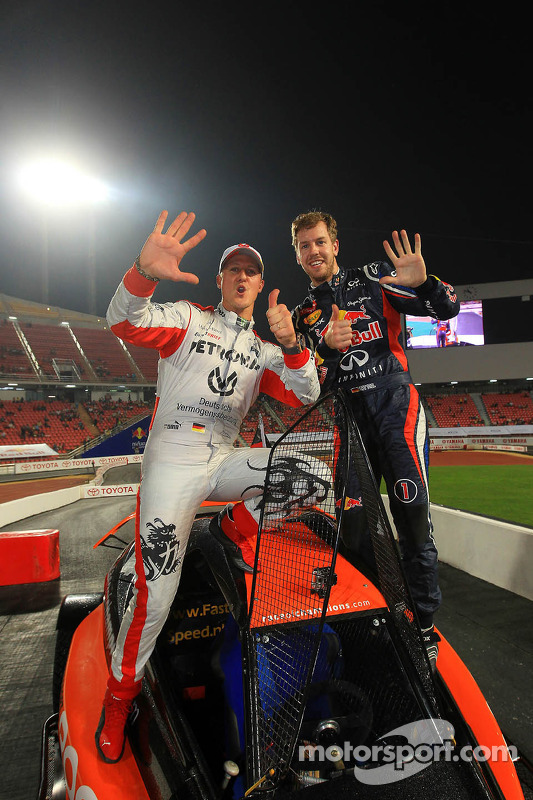 First place Sebastian Vettel and Michael Schumacher