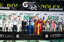 Class winners podium: GT winners Filipe Albuquerque, Oliver Jarvis, Edoardo Mortara, Dion von Moltke, DP winners Charlie Kimball, Juan Pablo Montoya, Scott Pruett, Memo Rojas, GX winners Nelson Canache, Shane Lewis, David Donohue, Jim Norman