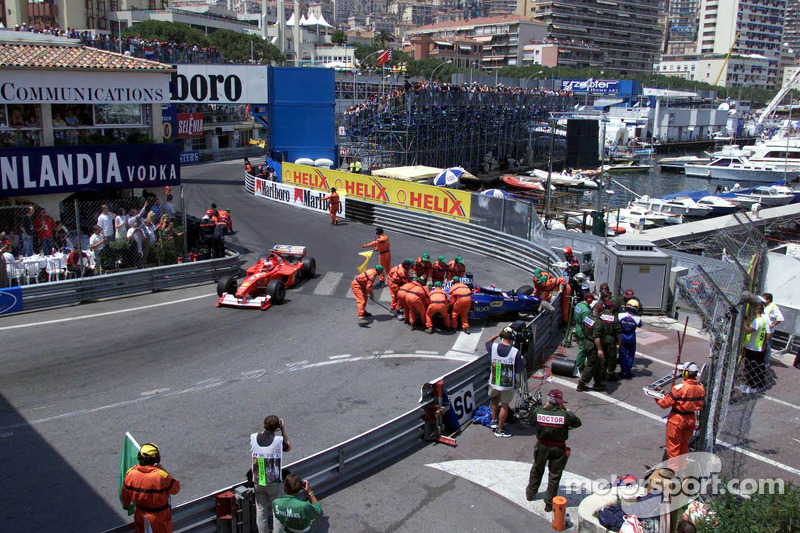 The crashed Prost Peugeot of Nick Heidfeld