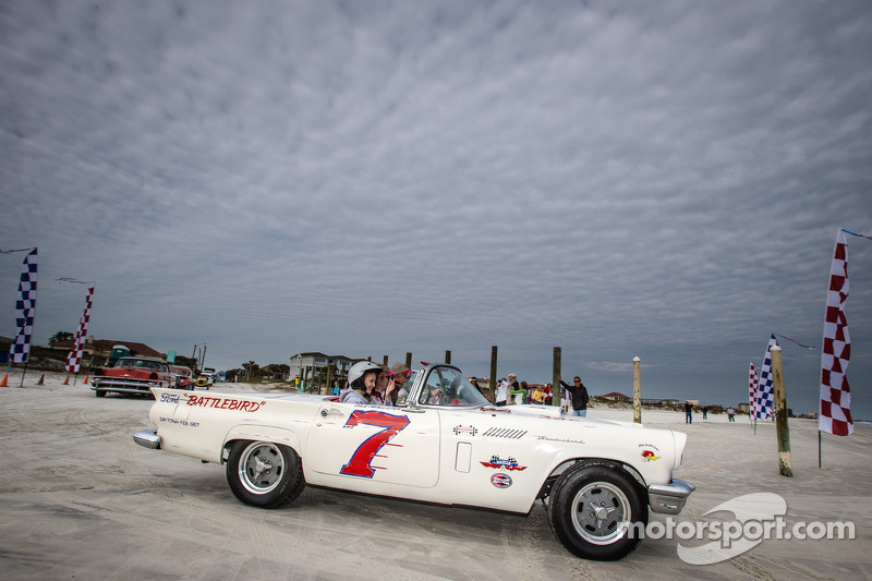 Vintage race cars parade on the beach