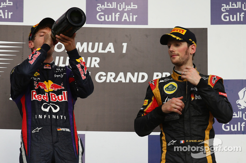 Sebastian Vettel, Red Bull Racing e Romain Grosjean, Lotus F1 E21