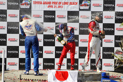 Victory circle: race winner Takuma Sato, A.J. Foyt Enterprises Honda, second place Graham Rahal, Rahal Letterman Lanigan Racing Honda, third place Justin Wilson, Dale Coyne Racing