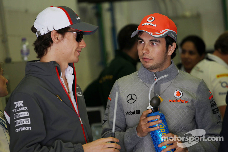 (L naar R): Esteban Gutierrez, Sauber met Sergio Perez, McLaren