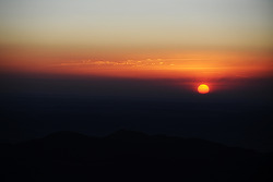 The sun rises over Pikes Peak