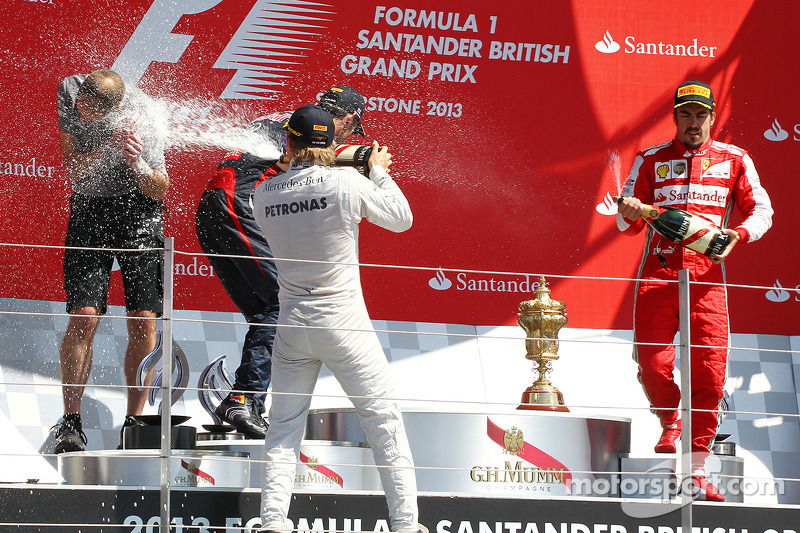 Race winner Nico Rosberg Mercedes AMG F1 celebrates on the podium 