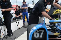 Sarah Fisher looks on