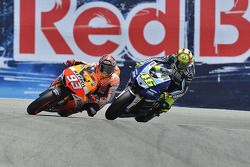 Marc Marquez, Repsol Honda Team passes Valentino Rossi, Yamaha Factory Racing