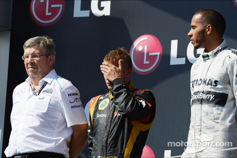 Het podium, Ross Brawn, Teambaas Mercedes AMG F1; Kimi Raikkonen, Lotus F1 Team, tweede; Lewis Hamil