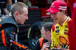 Mark Martin, Stewart-Haas Racing Chevrolet and Joey Logano, Penske Racing Ford