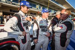 P1 and overall winners Klaus Graf and Lucas Luhr celebrate with Greg Pickett