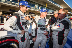 P1 and overall winners Klaus Graf and Lucas Luhr celebrate with Greg Pickett