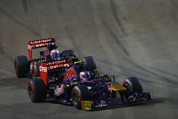 Daniel Ricciardo, Scuderia Toro Rosso STR8 leads Jean-Eric Vergne, Scuderia Toro Rosso STR8