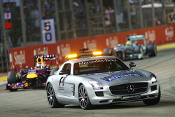 Sebastian Vettel, Red Bull Racing RB9 leads behind the FIA Safety Car