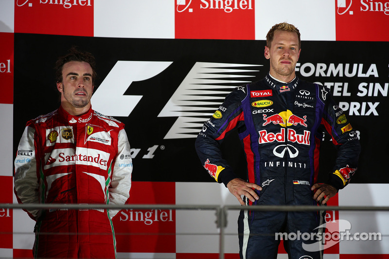 Fernando Alonso, Ferrari F138 and Sebastian Vettel, Red Bull Racing