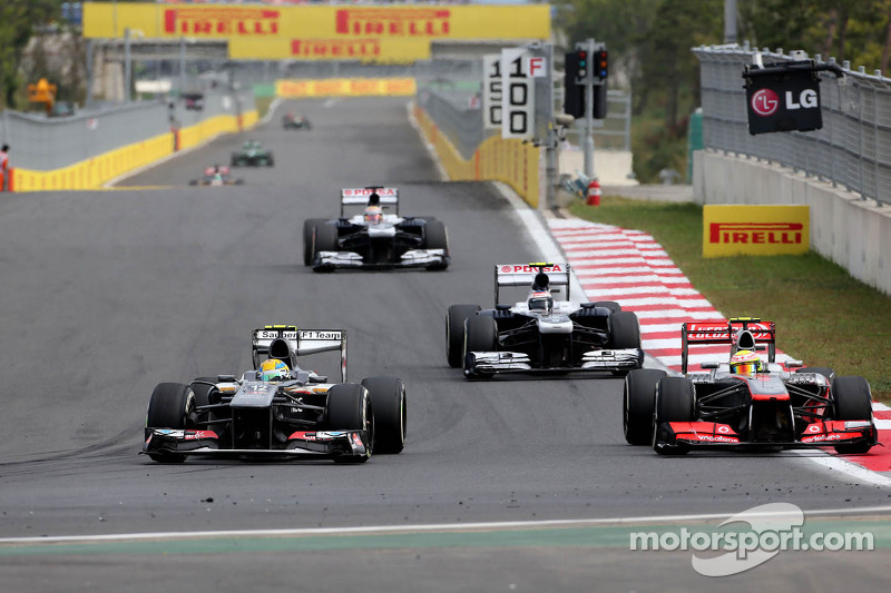 Esteban Gutierrez, Sauber F1 Team and Sergio Perez, McLaren Mercedes