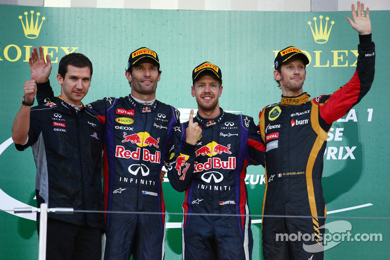 O vencedor Sebastian Vettel, segundo colocado Mark Webber, terceiro colocado Romain Grosjean