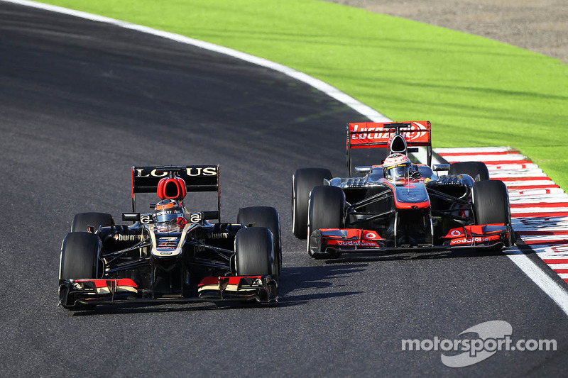 Kimi Raikkonen, Lotus F1 E21 e Jenson Button, McLaren MP4-28