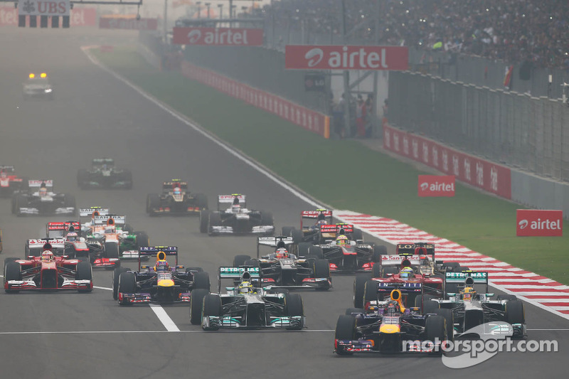 Sebastian Vettel, Red Bull Racing RB9 leads at the start of the race