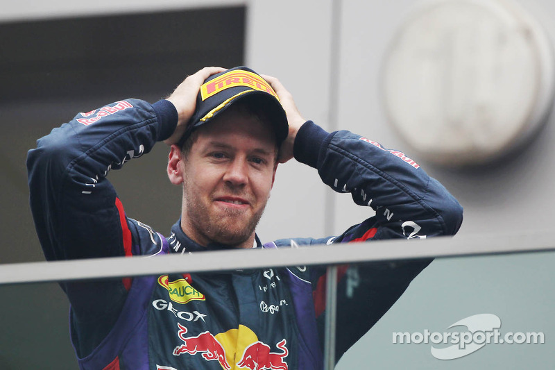 Ganador de la carrera y Campeón del Mundo Sebastian Vettel, Red Bull Racing celebra en el podio