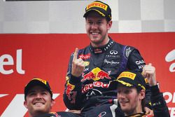 Podium: race winner and 2013 world champion Sebastian Vettel, second place Nico Rosberg, third place