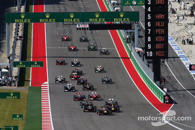 Sebastian Vettel, Red Bull Racing RB9 leads at the start of the race