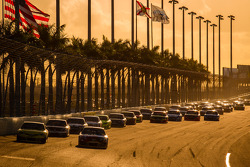 Kyle Busch, Joe Gibbs Racing Toyota and Matt Kenseth, Joe Gibbs Racing Toyota lead the field