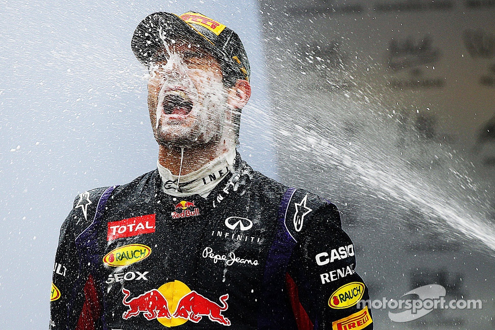 Mark Webber, Red Bull Racing celebrates his second position and final GP on the podium