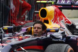 Mark Webber, Red Bull Racing RB9 arrives in parc ferme minus his helmet after finishing his last GP