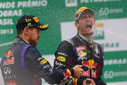 Race winner Sebastian Vettel, Red Bull Racing celebrates on the podium with team mate Mark Webber, Red Bull Racing